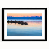 Abstract art print featuring textured, colorful art of Montana scenery in vibrant hues, framed with a black mat.