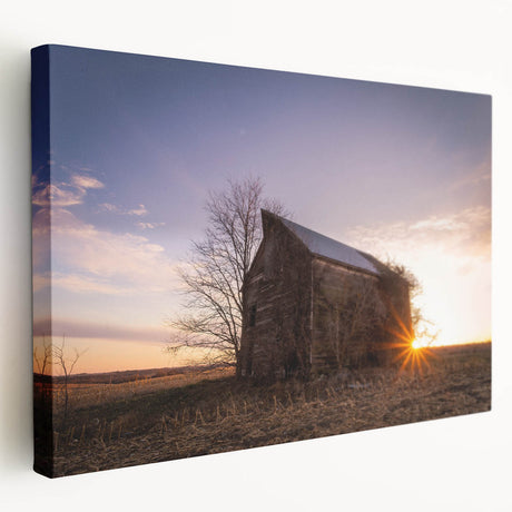 Side view of a large stretched canvas depicting a serene Nebraska landscape in soft earth tones.