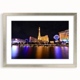 Textured art of abstract Las Vegas skyline in muted gray tones on a framed silver mat, ideal for modern bedroom ambiance.