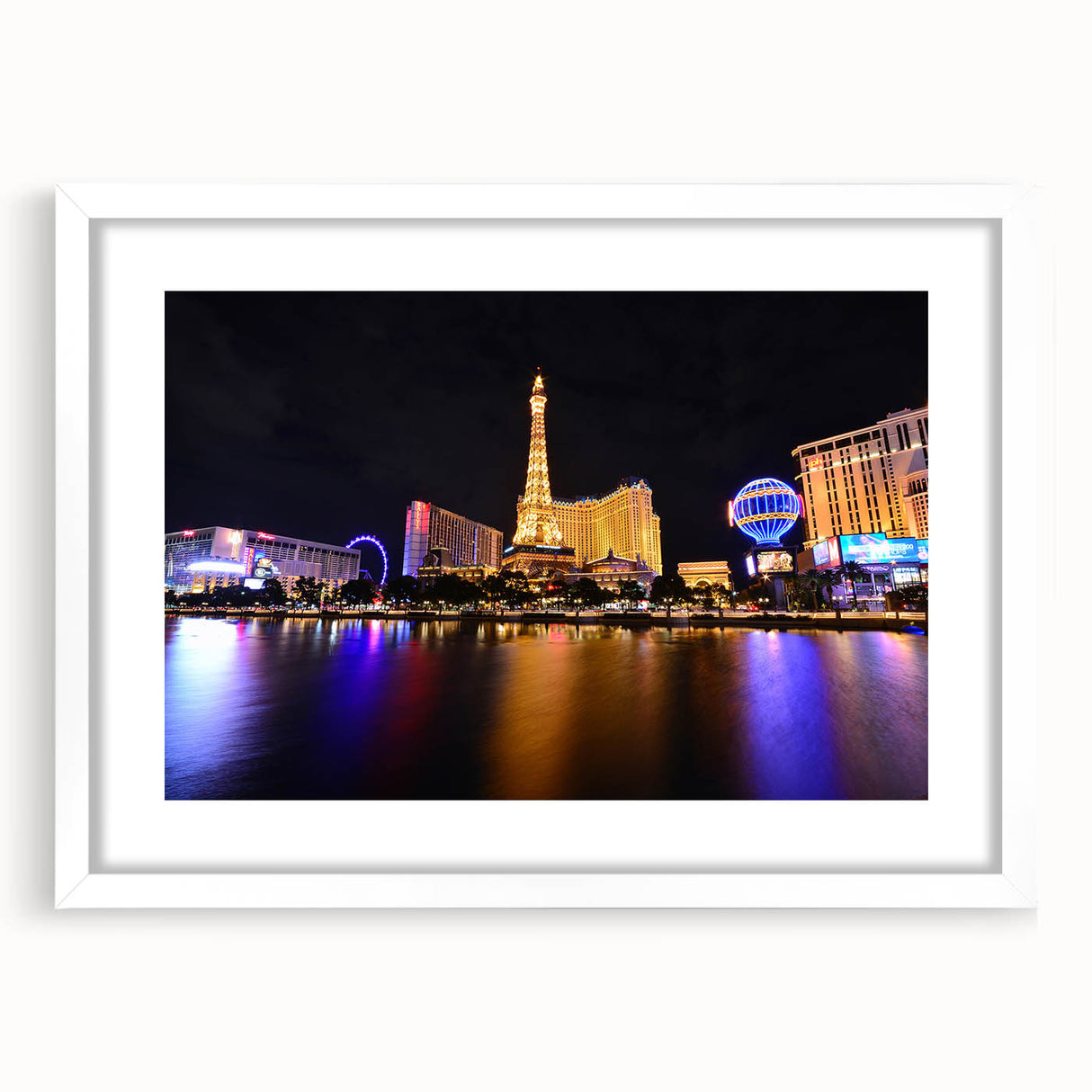 Abstract art print of Las Vegas skyline in muted gray and blue tones on a framed canvas, suitable for dining room decor.
