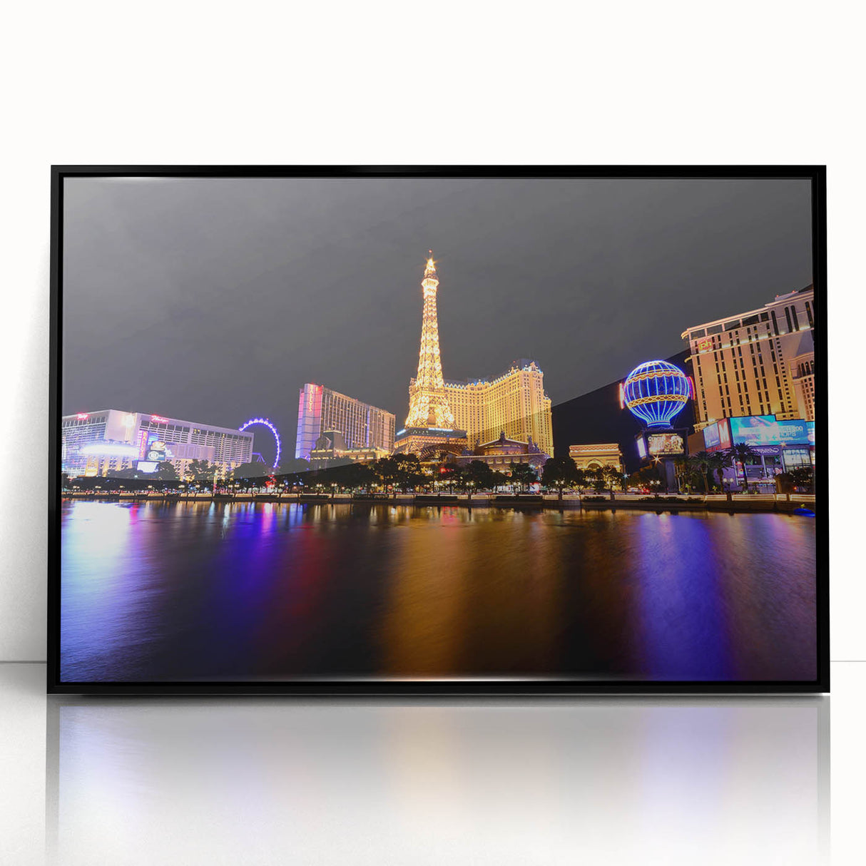 Large abstract wall art depicting the Las Vegas skyline in muted black and gray tones on a framed acrylic print.