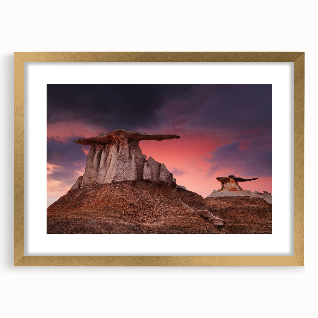 Extra large abstract art print of New Mexico scenery in gold frame, featuring textured earth tones.