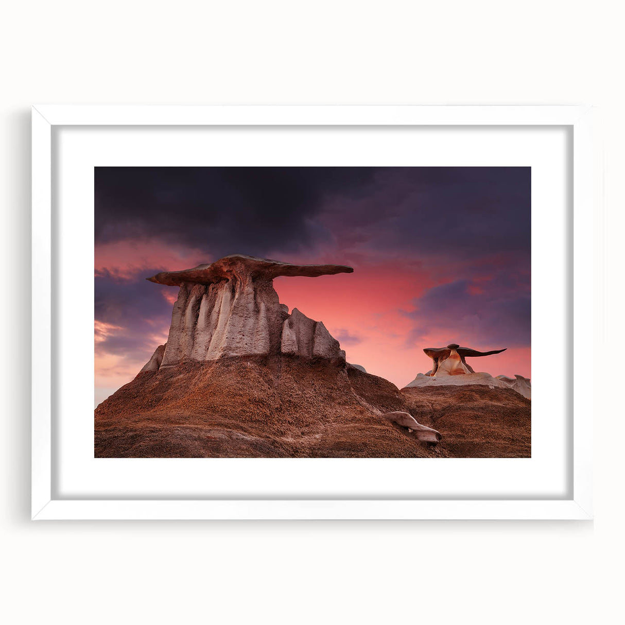 Abstract art print of a New Mexico landscape in muted earth tones on a white framed canvas, suitable for dining room decor.