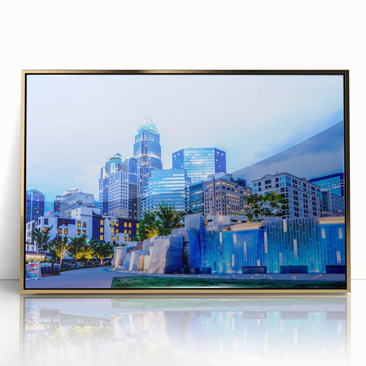 Mid-century modernist art of Charlotte skyline in gold and blue tones on framed acrylic, suitable for modern art wall decor.