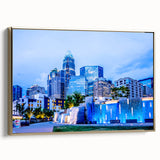 Framed canvas of Charlotte, North Carolina skyline in muted gold and black tones, suitable for bedroom wall art.