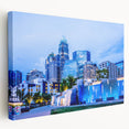 Charlotte skyline in muted gray and blue tones on stretched canvas, suitable for kitchen wall art.