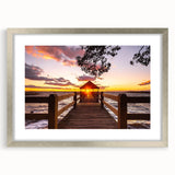 Textured abstract art print of the Outer Banks, North Carolina, in cool blue and gray tones on a silver-framed mat.