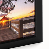 Black wall art featuring a textured depiction of the Outer Banks in North Carolina on a framed canvas.