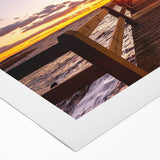 Art deco poster of Outer Banks, North Carolina on rolled canvas, featuring muted blue and beige tones.