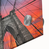 Large abstract wall art of NYC's Brooklyn Bridge in muted gray and blue tones on acrylic glass, ideal for dining room art.