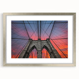 Textured art print of the Brooklyn Bridge in muted gray shades on a framed silver canvas, suitable for bedroom decor.