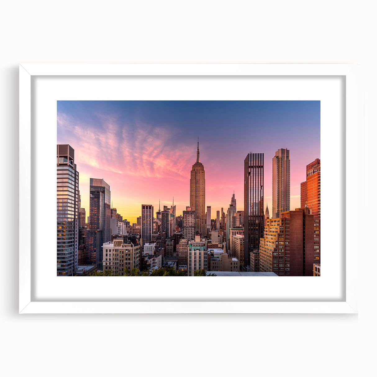 Abstract art print of the Chrysler Building in muted gray and silver tones on a framed white mat.