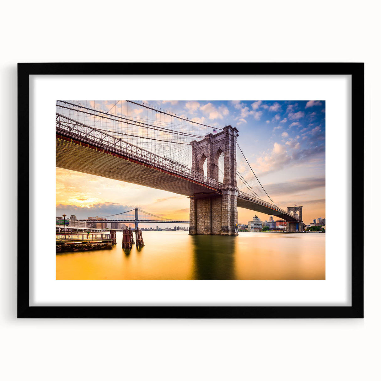 Extra large framed wall art of Manhattan Bridge in vibrant, colorful abstract style, ideal for living room decor.
