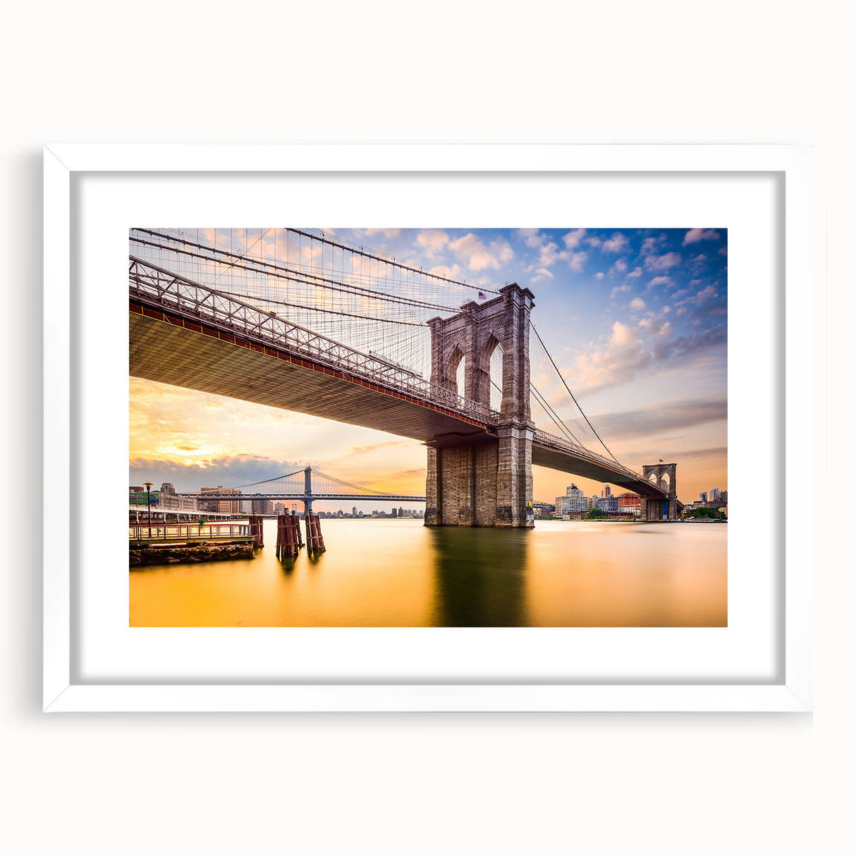 Abstract art print of the Manhattan Bridge in muted gray and blue tones on a framed white mat.