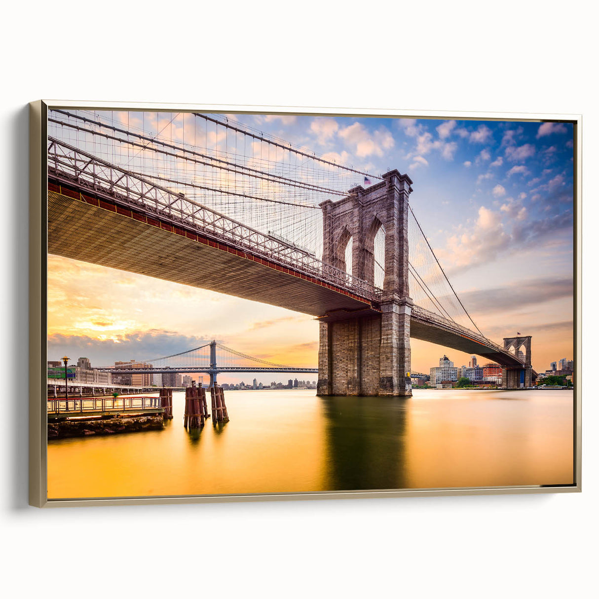 Framed canvas of Manhattan Bridge in black and gold tones, ideal for bedroom wall art.