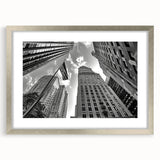 Textured abstract art print of New York City skyline in muted gray tones, framed in silver, ideal for bedroom art.