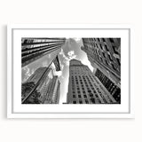 Abstract art print of New York City skyline in muted gray tones on a white framed mat, suitable for dining room decor.