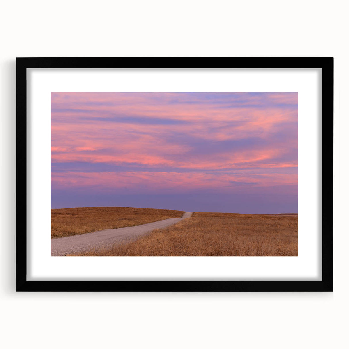 Abstract art print of vibrant, colorful scenery, textured finish on a large framed canvas, ideal for living room decor.