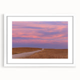 Abstract art print of Oklahoma scenery in muted earth tones on a white framed canvas, suitable for dining room decor.