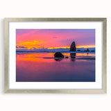Textured art print of Cannon Beach, Oregon, in muted earth tones on a framed canvas, ideal for bedroom art.