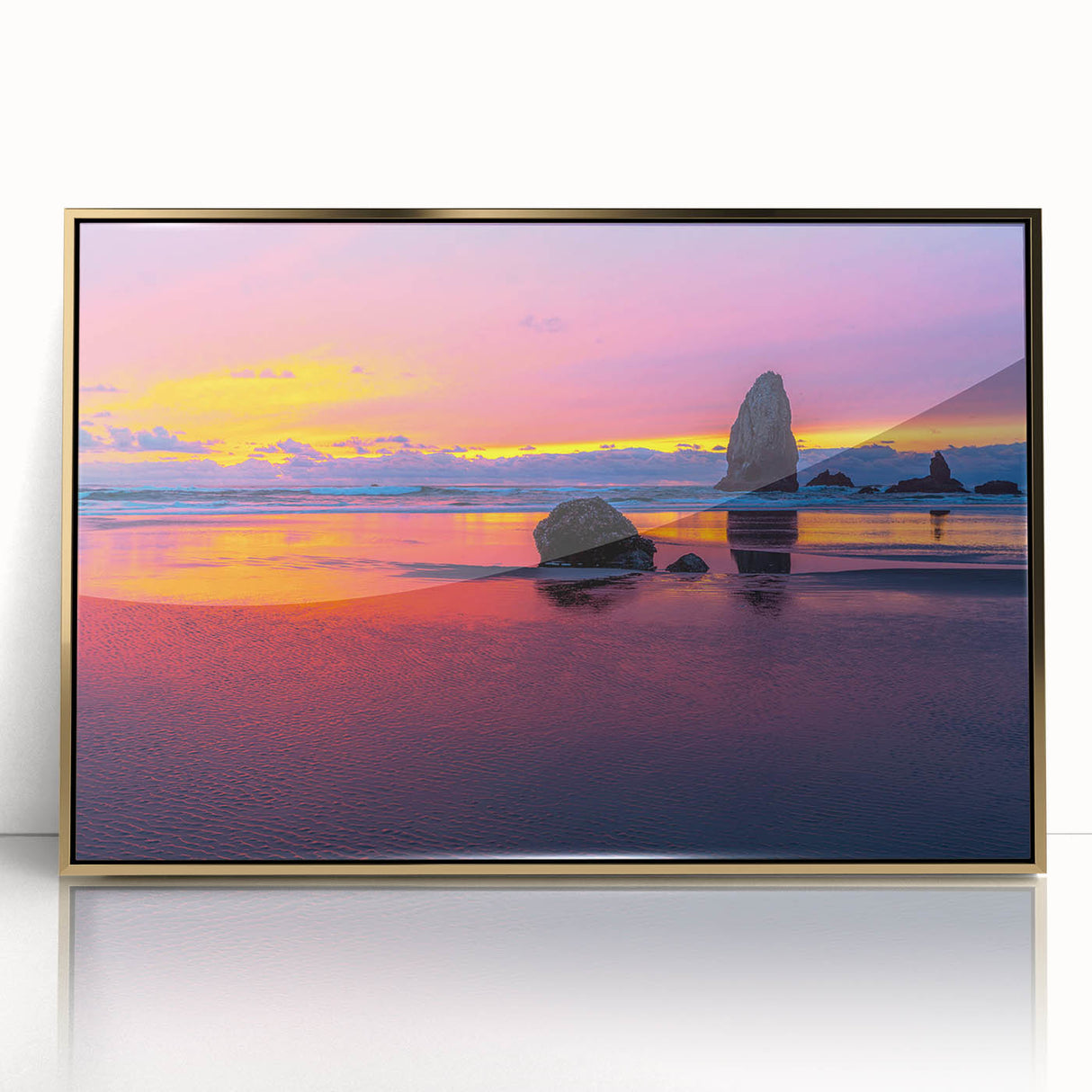 Large art print of Cannon Beach, Oregon, in muted earth tones on a framed acrylic, suitable for modern nursery decor.