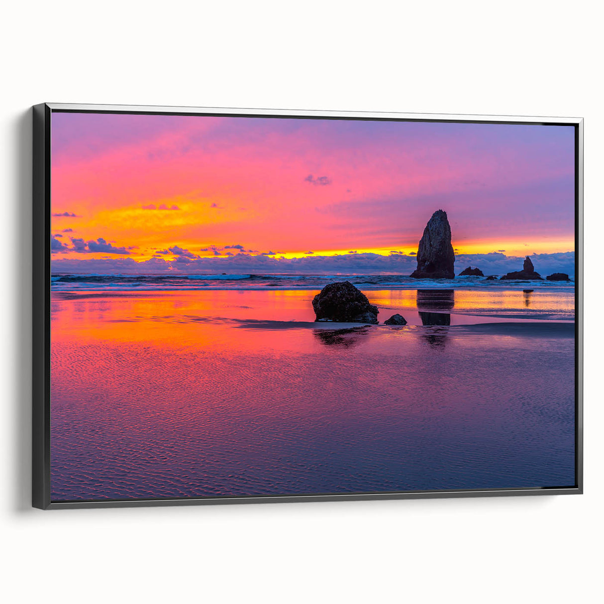 Black and white framed canvas of Cannon Beach, Oregon, in a vintage poster style, ideal for bedroom wall art.