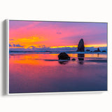 Framed canvas vintage poster art depicting Oregon's Cannon Beach with muted earth tones, ideal for living room decor.