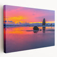 Large art print of Cannon Beach, Oregon, with muted blue and gray tones on stretched canvas, suitable for kitchen wall decor.