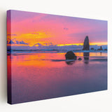 Large art print of Cannon Beach, Oregon, with muted blue and gray tones on stretched canvas, suitable for kitchen wall decor.