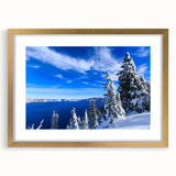 Extra large framed wall art of Crater Lake in Oregon, featuring textured abstract art prints in muted blue and green tones.