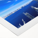 Art deco poster of Crater Lake in muted blue and green tones on rolled canvas, suitable for dining room wall art.