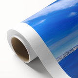 Art deco poster of Crater Lake, Oregon in muted blue tones on rolled canvas, ideal for nursery wall art.