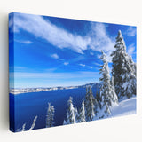 Crater Lake, Oregon depicted in vibrant blue and green hues on a large stretched canvas, ideal for kitchen wall art.