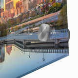 Large abstract depiction of Philadelphia skyline in muted blues and grays on acrylic glass, suitable for dining room art.