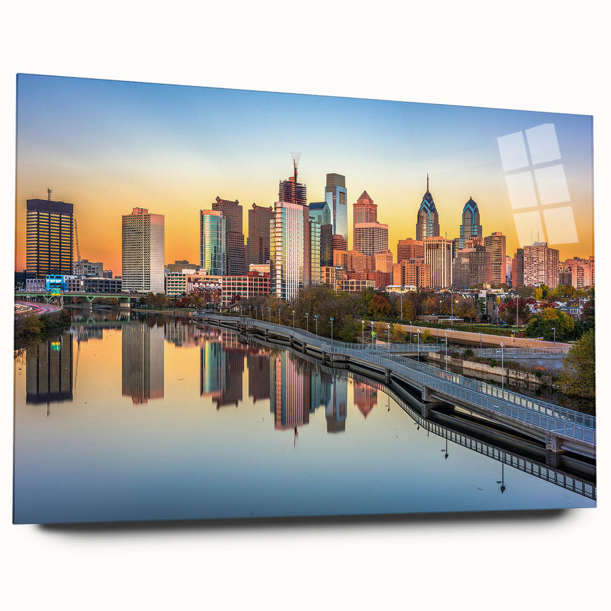 Large abstract depiction of the Philadelphia skyline in muted blue and gray tones on acrylic glass.