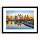 Abstract art print of colorful, textured Philadelphia scenery on a large black-framed canvas, ideal for living room decor.