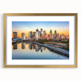 Extra large abstract art print of Philadelphia skyline in textured gold frame, ideal for living room decor.
