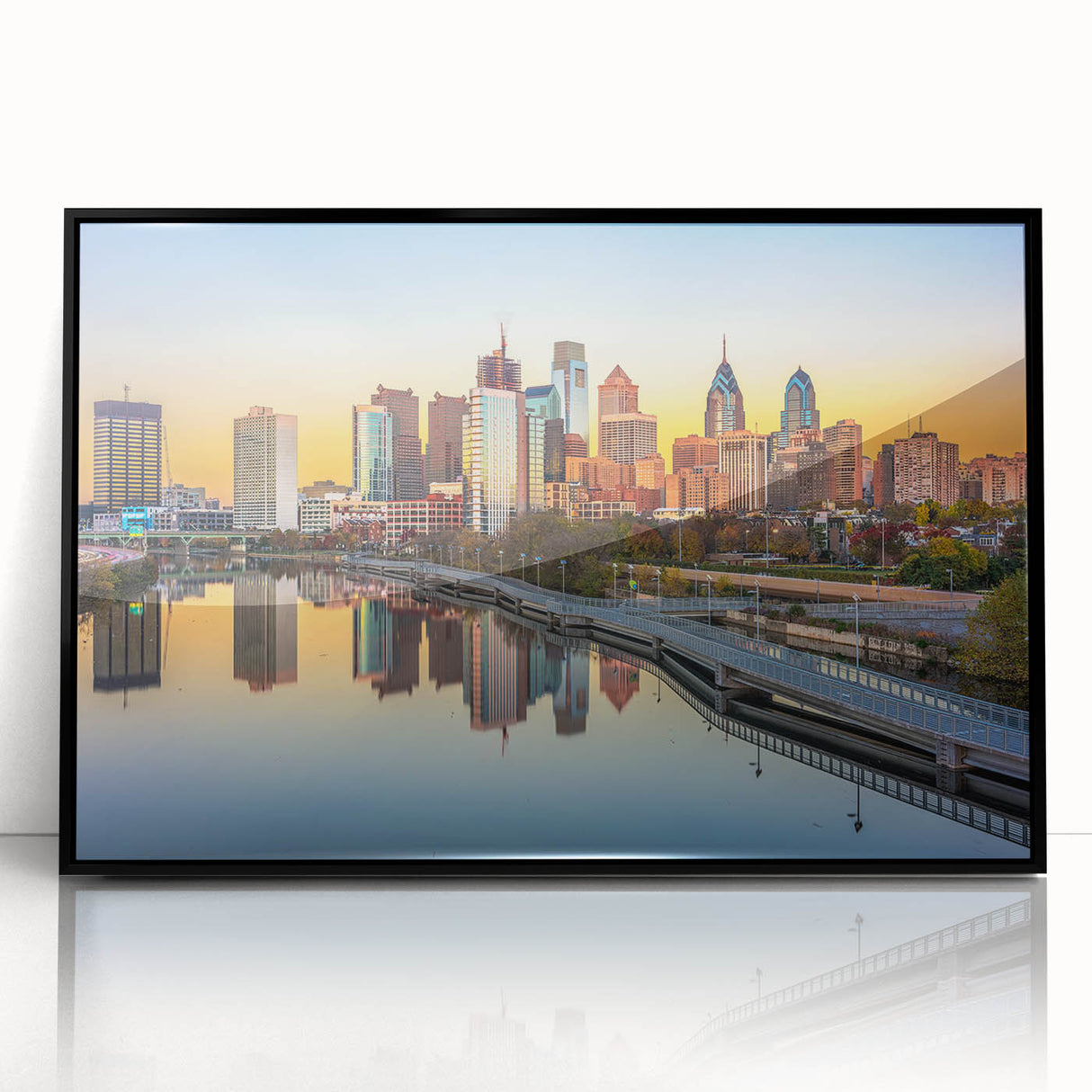 Large abstract wall art depicting the Philadelphia skyline in muted gray and blue tones on a framed acrylic print.