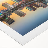 Art deco poster of Philadelphia skyline in muted gray and blue tones on rolled canvas, ideal for dining room wall art.