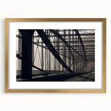 Extra large wall art featuring an abstract print of Pittsburgh skyline in textured gold and black tones on a framed canvas.