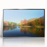 Mid-century modernist art depicting a Pennsylvania landscape, in muted earth tones on a silver-framed acrylic print.