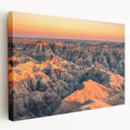 Large art print of South Dakota Badlands on stretched canvas, featuring earthy red and brown tones.
