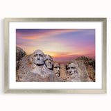 Textured art print of Mt. Rushmore in muted earth tones on a framed canvas, suitable for bedroom decor.