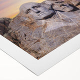 Art deco poster of Mt. Rushmore in muted earth tones on a rolled canvas, suitable for dining room decor.