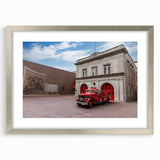 Textured abstract art print of Memphis scenery in muted earth tones on a framed silver mat, ideal for bedroom art.
