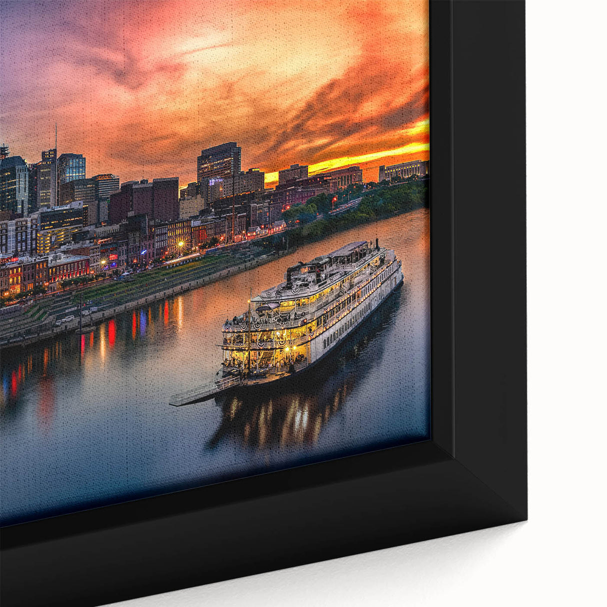 Close-up of textured black wall art depicting the Nashville skyline, with colorful accents on a framed canvas.