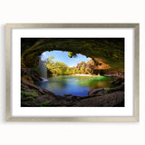 Textured abstract art print of Austin skyline in muted earth tones on a framed silver mat, suitable for bedroom decor.