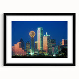 Colorful abstract art print of Dallas skyline featuring vibrant blue and orange hues on a large framed canvas.