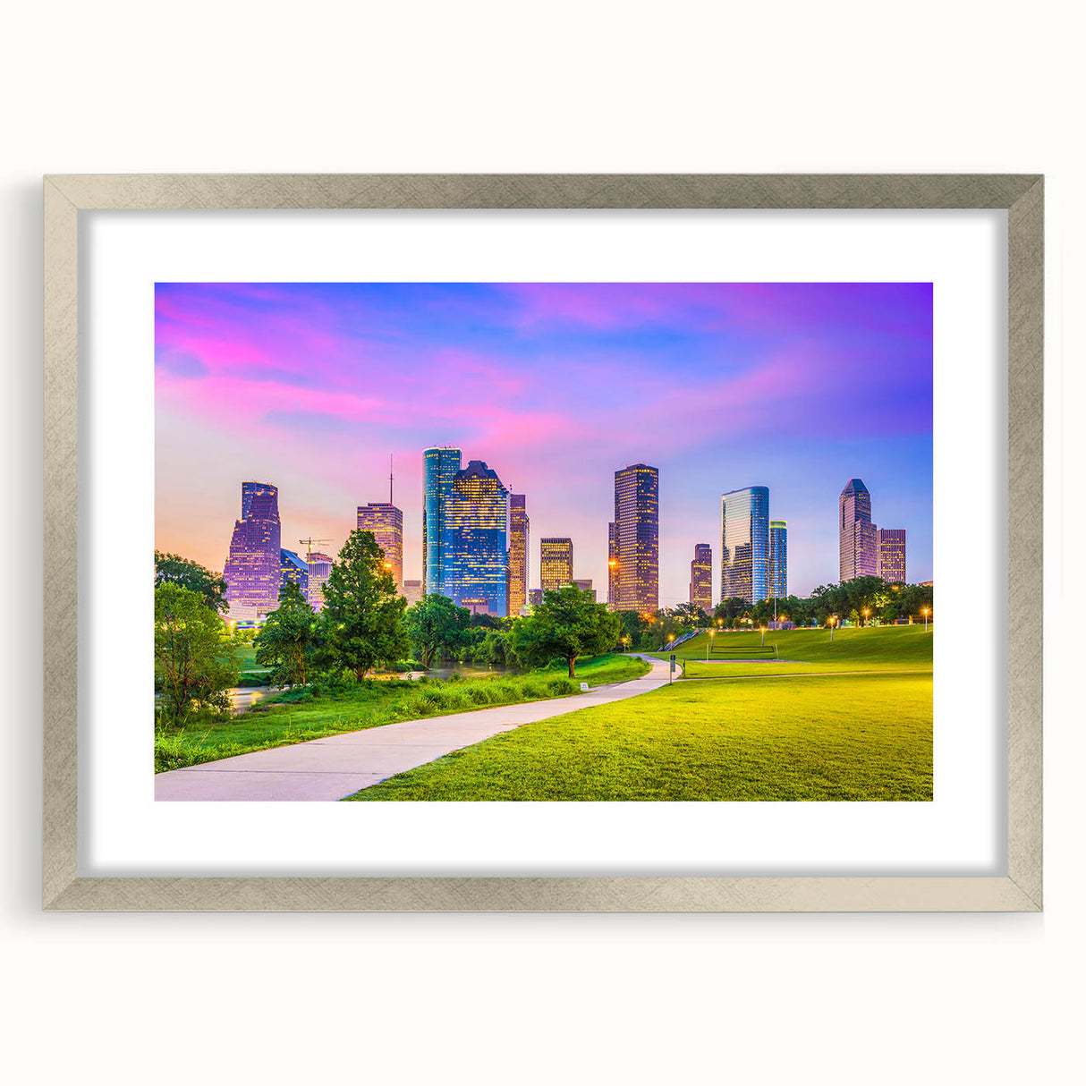 Textured art print of abstract Houston skyline in muted gray and silver tones, framed in silver, suitable for bedroom decor.