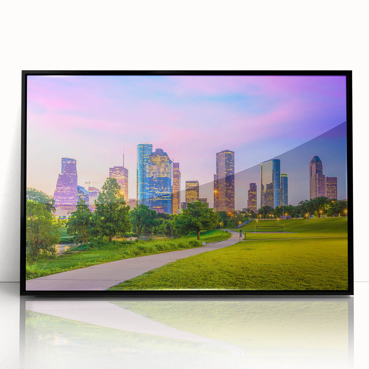 Large abstract wall art of Houston skyline in muted gray and blue tones, acrylic print in black frame.